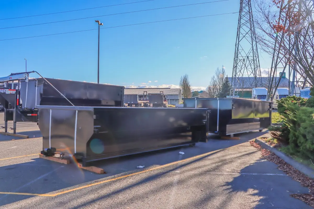 Roll-off dumpster ready for waste disposal at job site for 4 Yard Dumpster Rental in Manchester